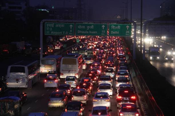 People rushing in a metro city—symbolic of the daily grind